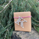 Letter K gift tag wrapped with twine